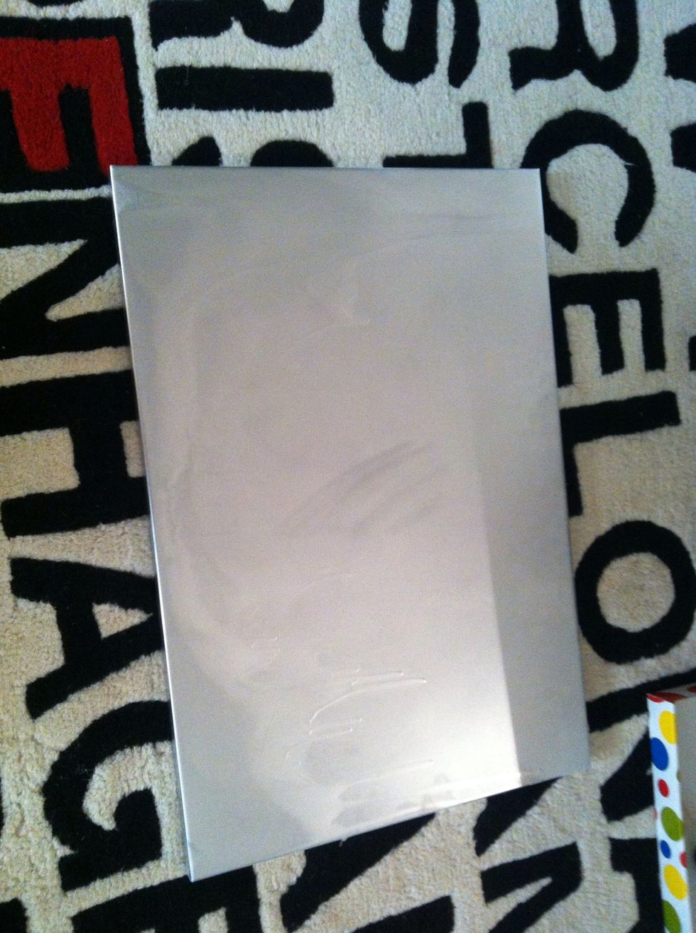 Its ok if the spray paint is not even. Its going to be covered with fabric anyway.