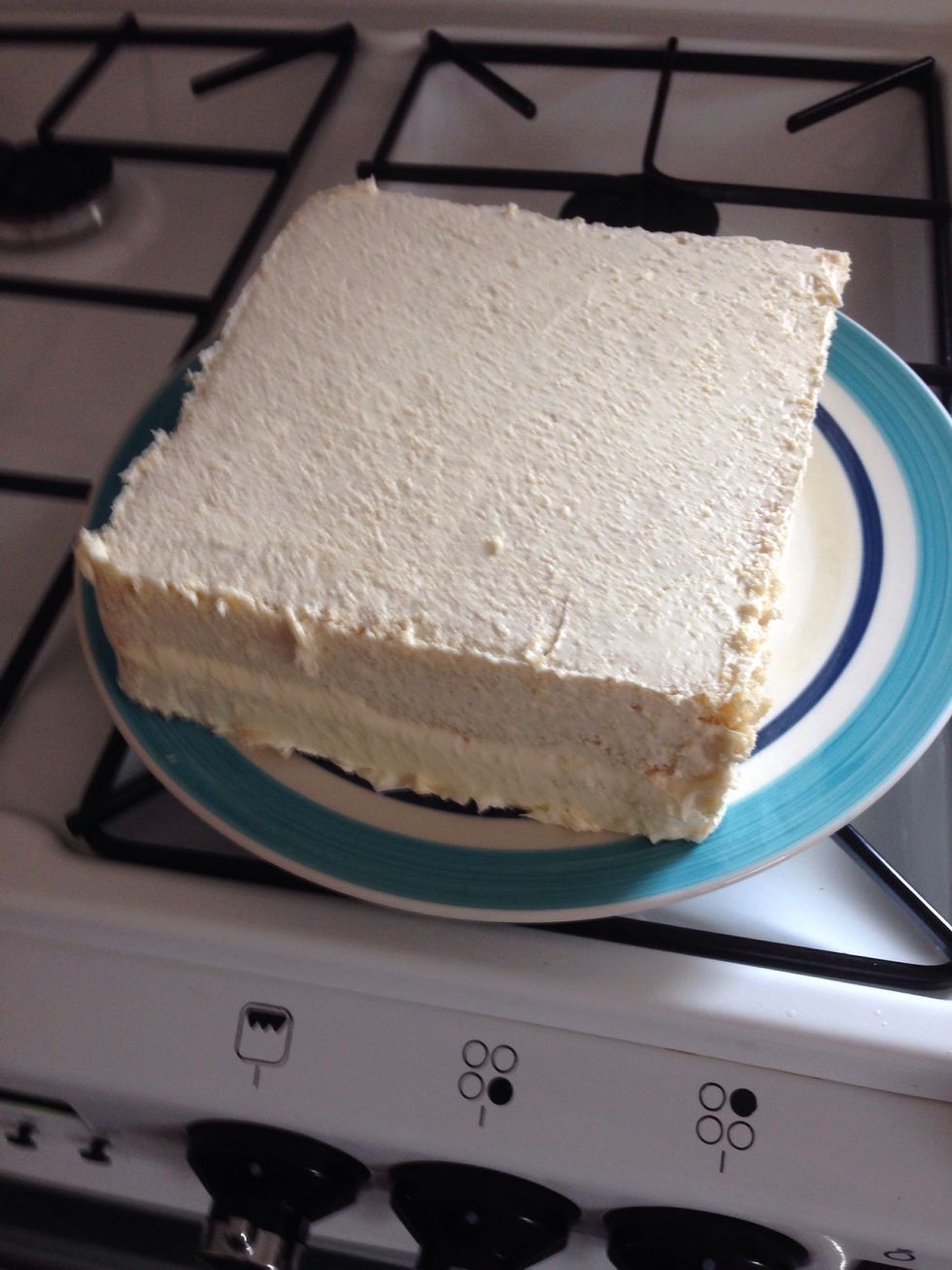 Ive put the butter cream all over the cake so the icing will stick, put in the fridge for about 10 mins to stiffen the buttercream