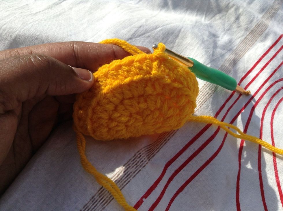 Join with sl st to top (both loops) of 1st hdc. This row formed the sides of the jar cozy as you can see.