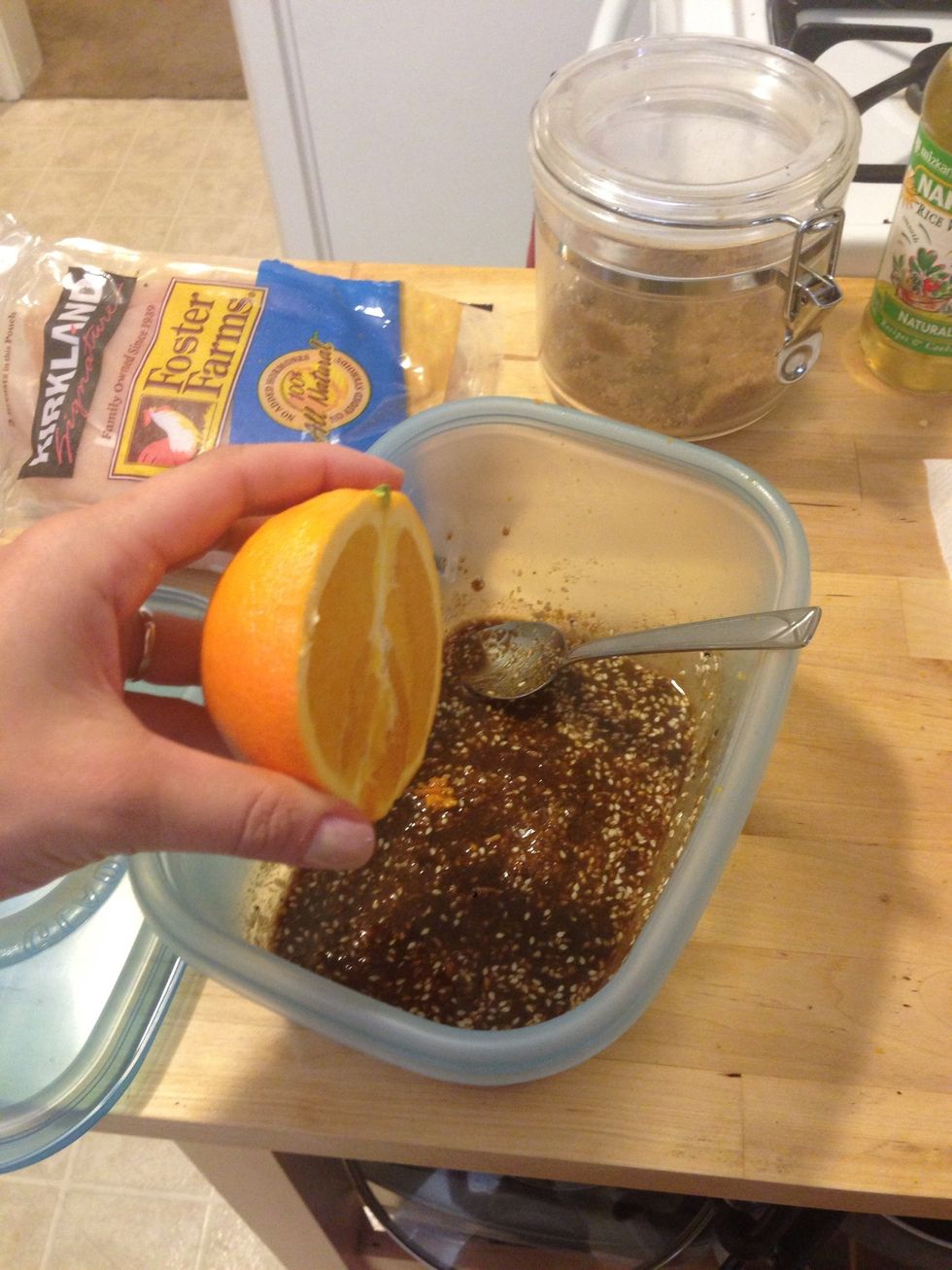 Juice half of the orange and add it to the mixture.