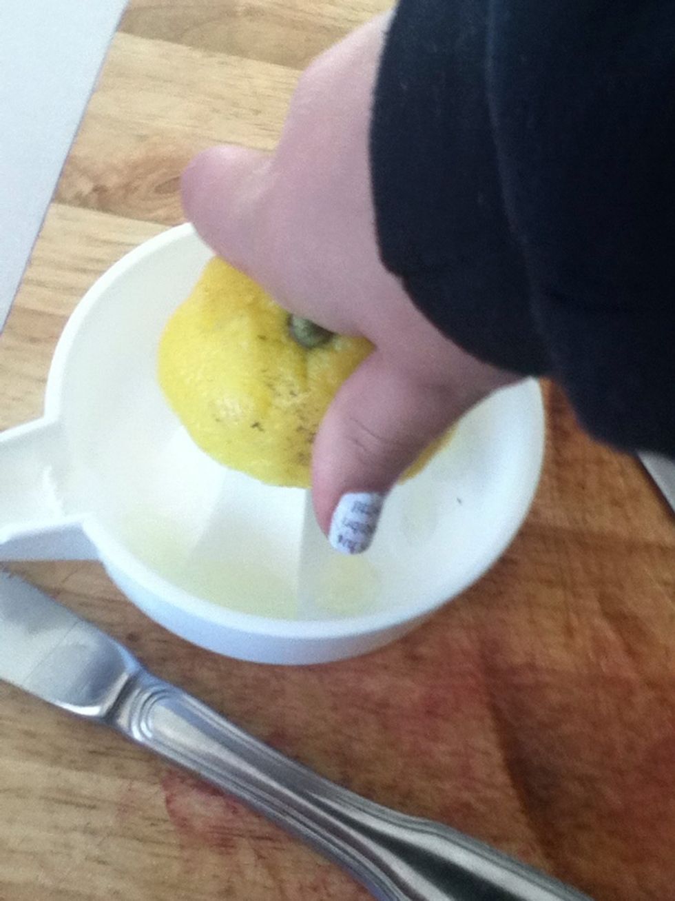 Juice half your lemon