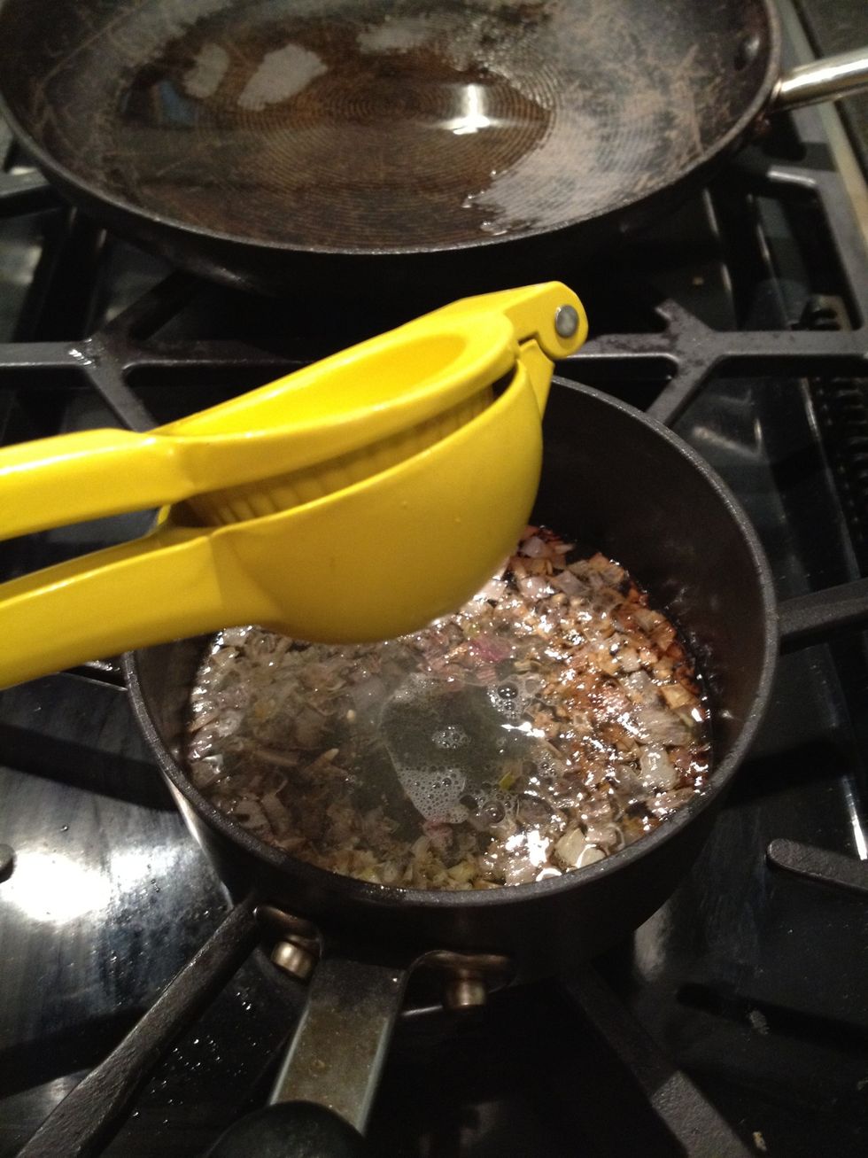 Juice lemon into sauce pot.