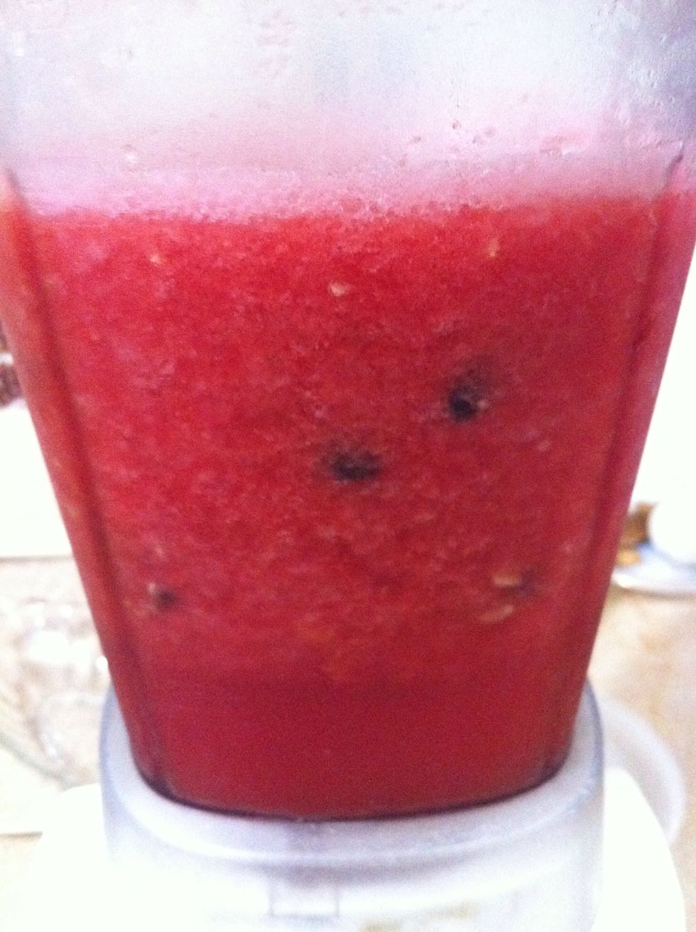 Juicy Watermelon chunks perfectly blended into juice. Strain out the seeds if you want