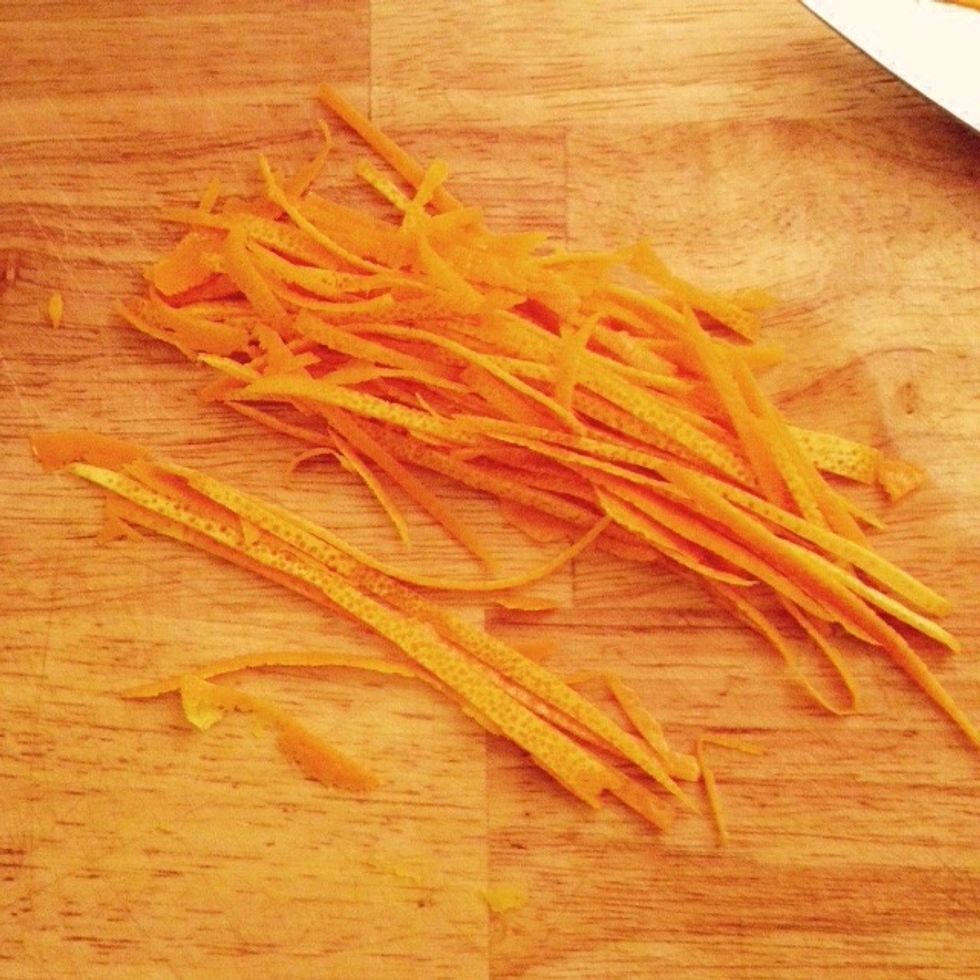 Julienne the orange skin to make some fine zest of it.