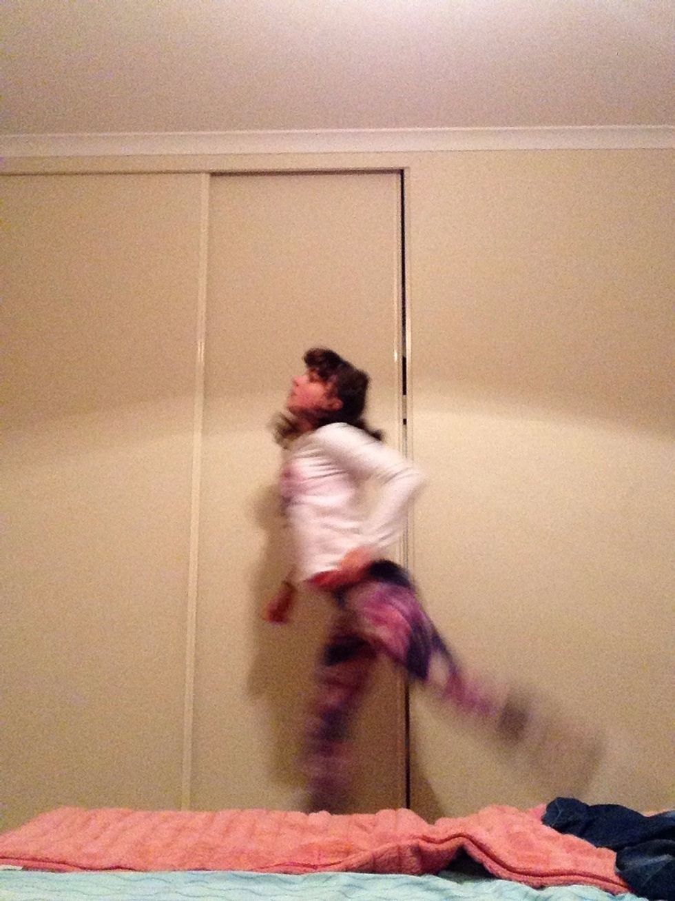 Jump and put ur legs out like ur doing the splits