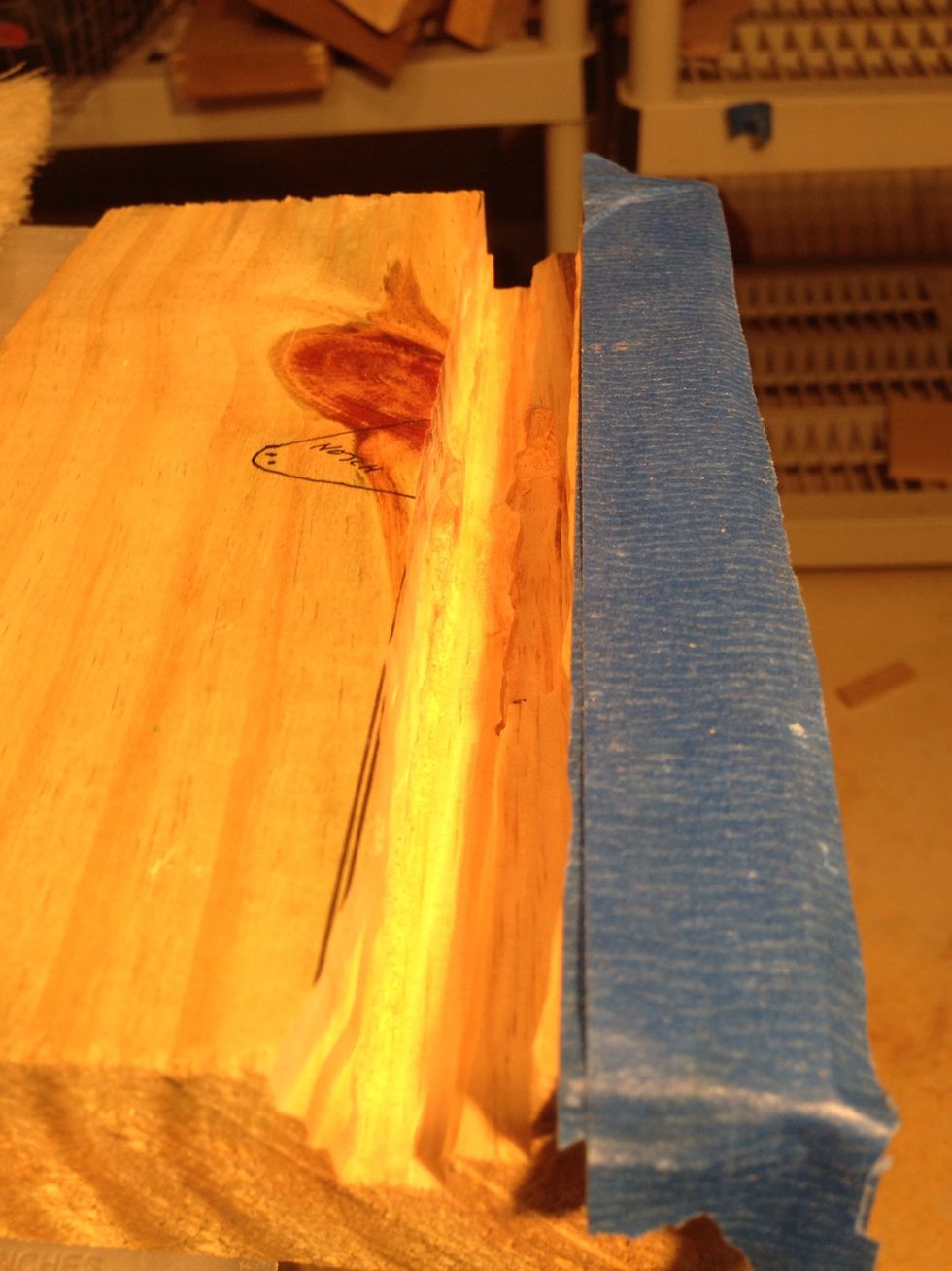 Just a channel I cut two different heights so iPad locks in.