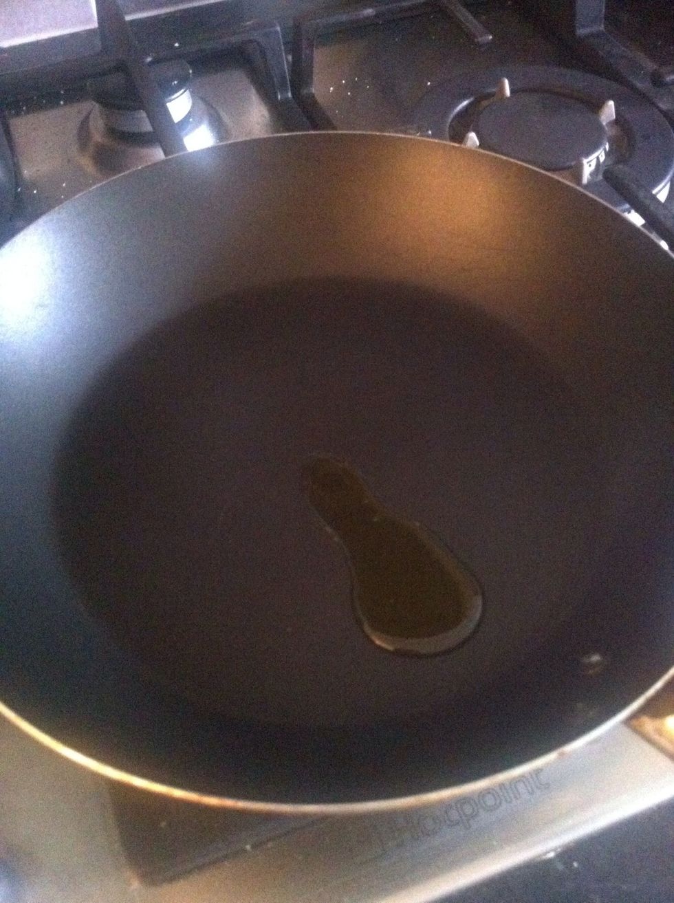 Just a little bit. Half spoon maybe wait for like 30 second on low heat or medium till the oil move quickly on the pan