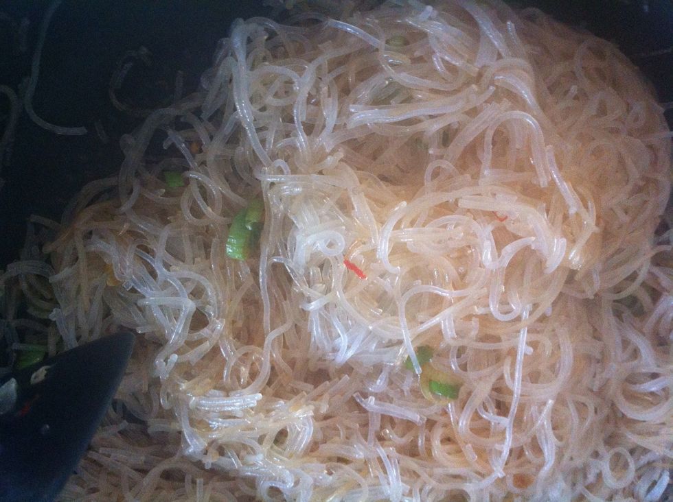Just add the cooked noodles to the seasoning and mix it. Add a squeeze of lemon juice. Put it aside and let it cool down.