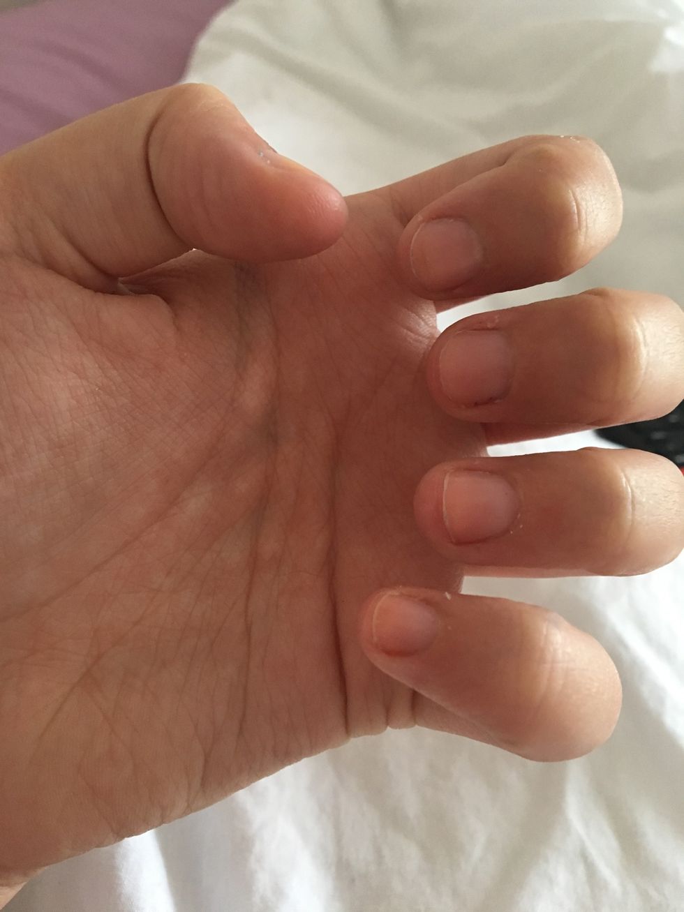 Just applied cuticle softener and pushed my cuticles back. Also added a layer of 7 day growth formula to help my nails grow faster.