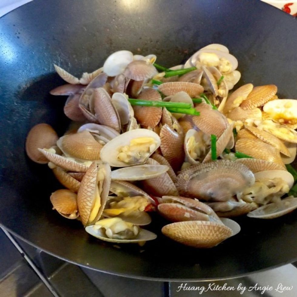 Just before dishing out, mix in the cut spring onion. Serve immediately with rice. So Enjoy!