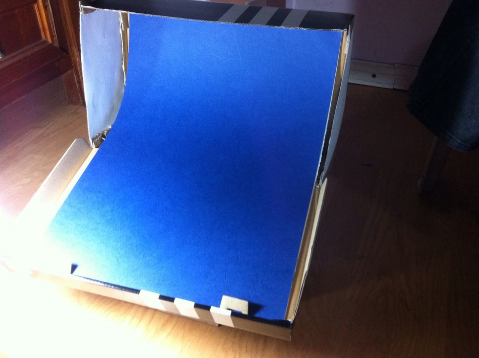 Just insert it on the white sheet. Again, DO NOT FOLD.