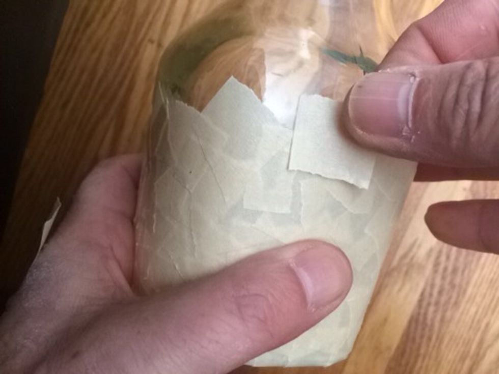 Just keep adding tape, making sure to overlap each piece so no glass shows. No need to do this in any specific pattern.