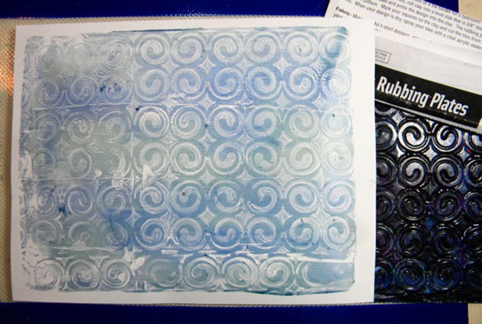 Just lay down paint, press the rubbing plate into the Gelli Plate to create the pattern and print. Rubbing plates come in lots of different patterns.