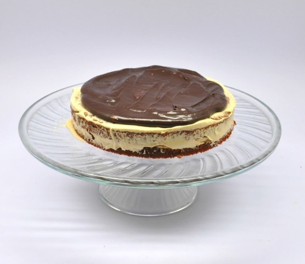 Just place a good amount of it on the top, and slowly work your way towards the sides.