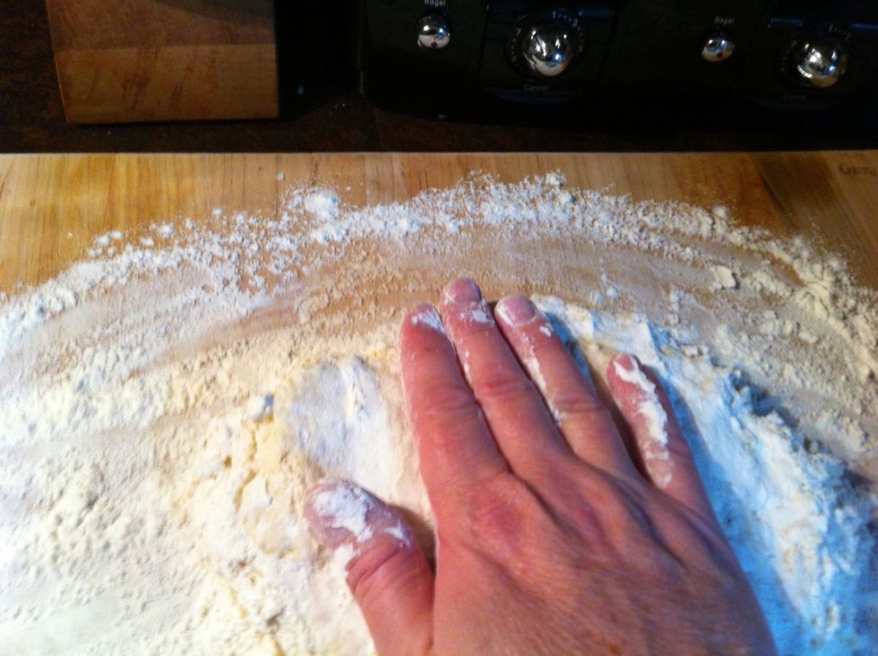 Just start mashing dough down to desired thickness.