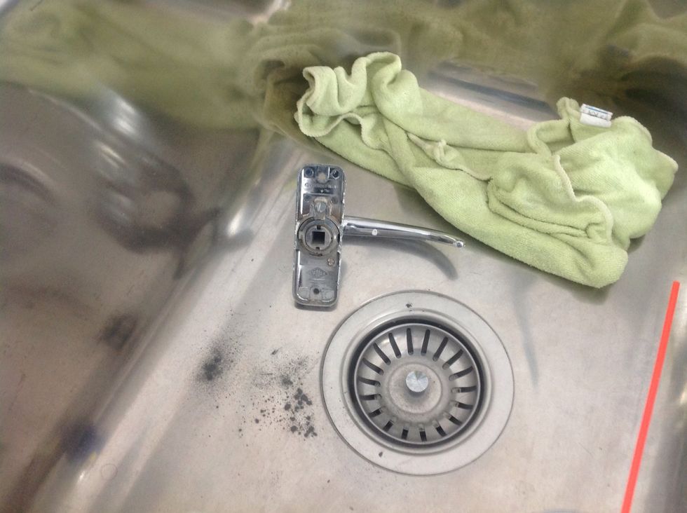 Just take this part off of the door (only one at a time). Put it somewhere that's easy to clean-up