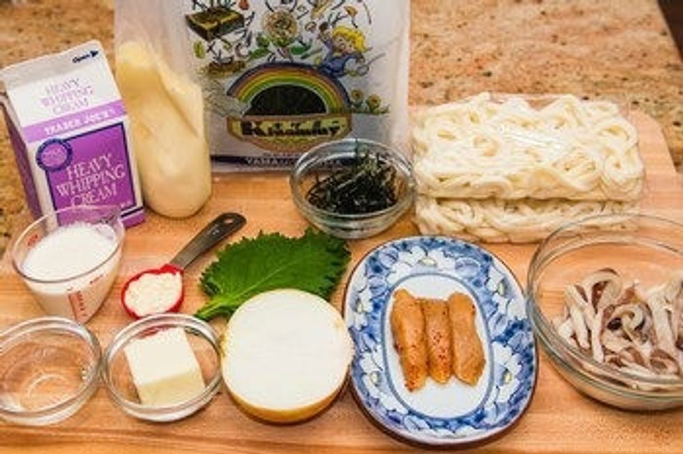 karashi mentaiko Japanese mayonnaise heavy cream soy sauce Sanuki Udon onion unsalted butter pre-sliced squid sake Sea salt ground black pepper 10 shiso leaves (perilla) Kizami nori Shichimi togarashi