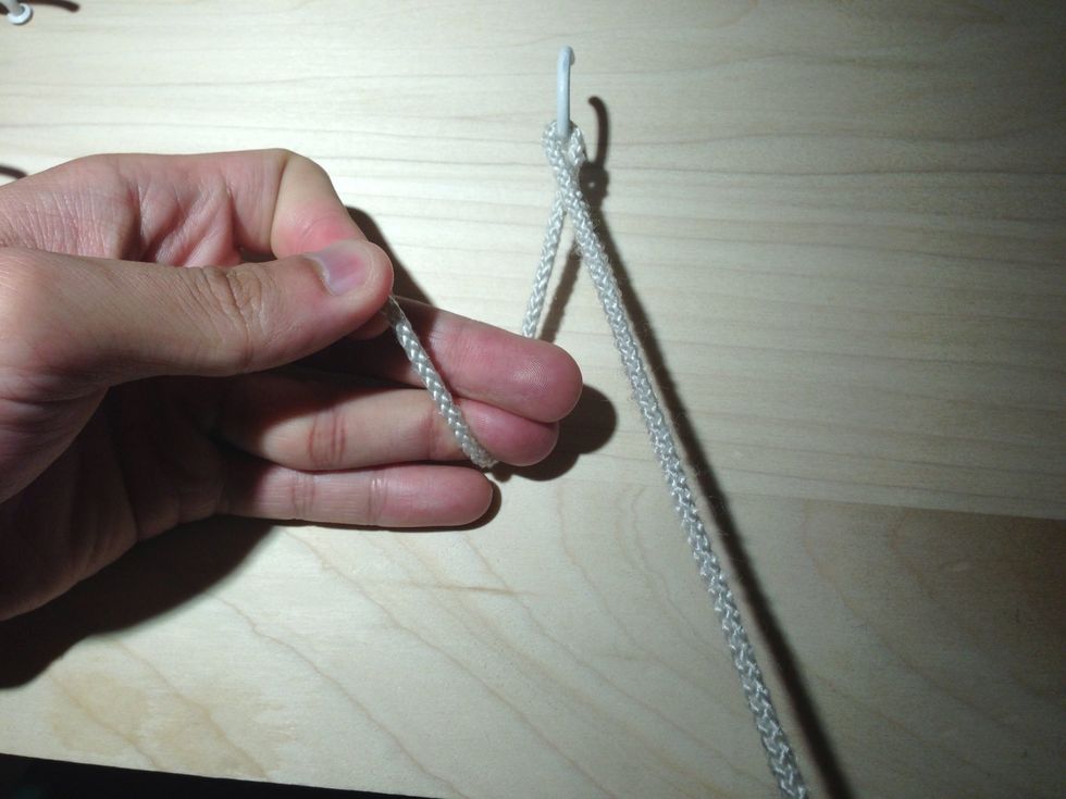 "Karate chop" the suture with the lateral aspect of your ring and middle finger.