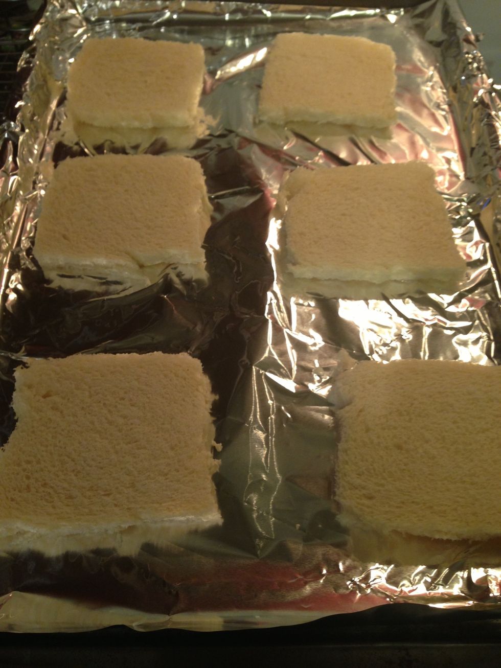 Kay your bread out on your foil lined pan.