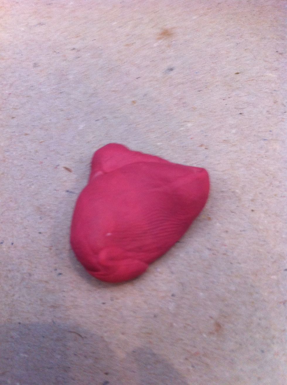 keep adding and stretching the blue tack with the marker until it becomes red or pink