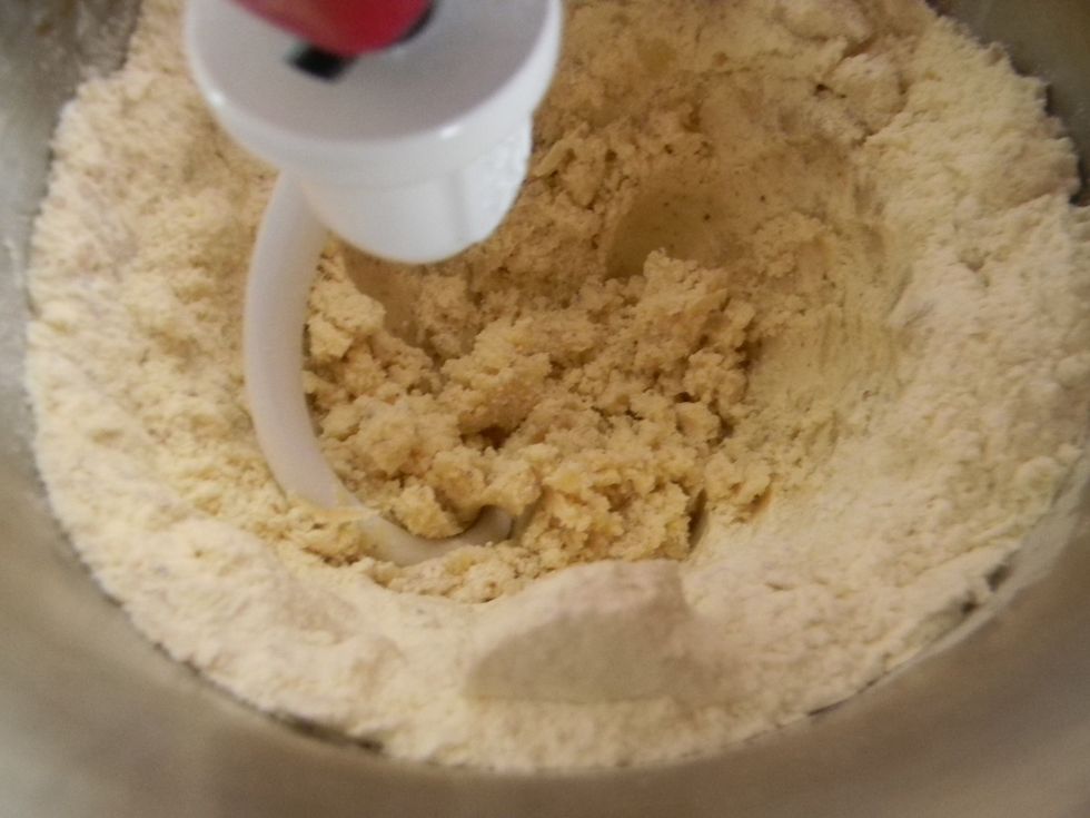 Keep adding flour until all of it is incorporated into the dough.