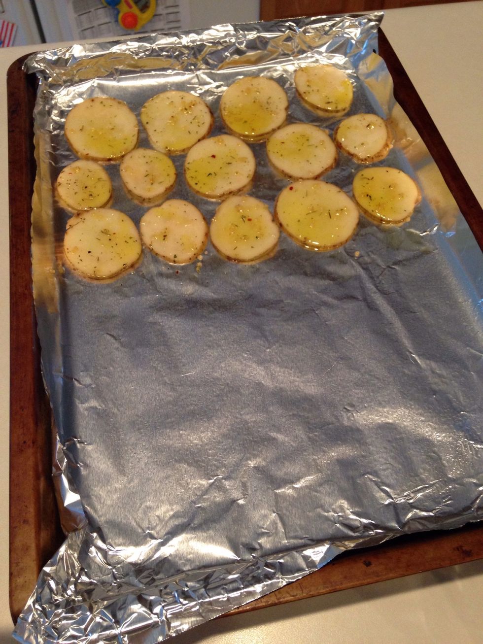 Keep adding potato slices until pan is full. If you sliced your potatoes thin like mine, you might need 2 pans.