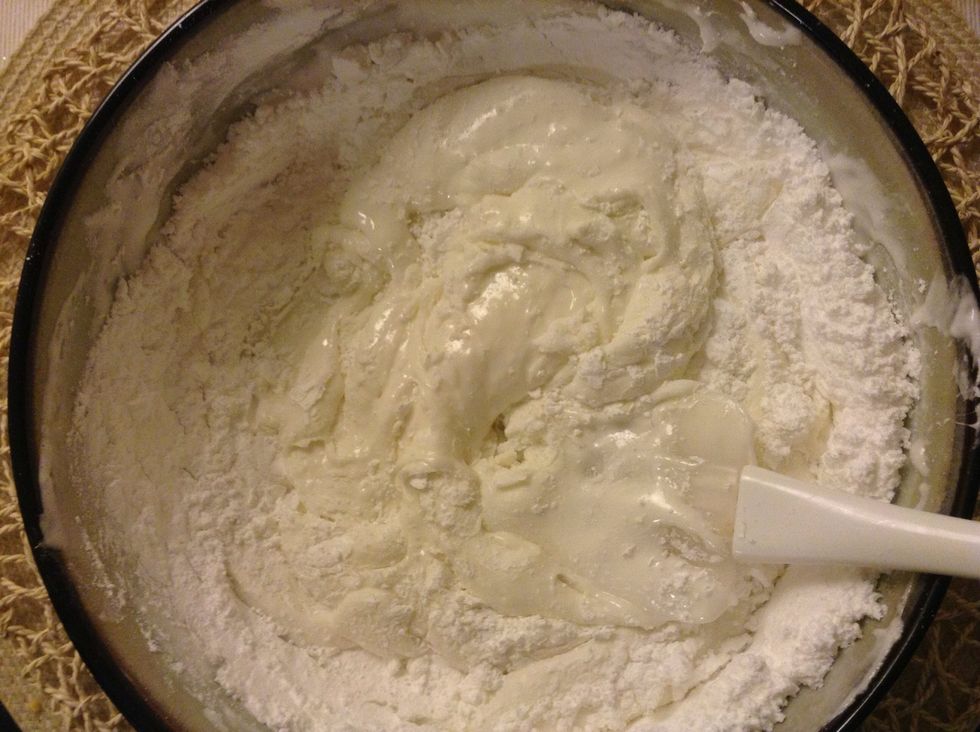 Keep adding powdered sugar at 1/2 c increments and stir. Stirring will become harder, but keep at it!