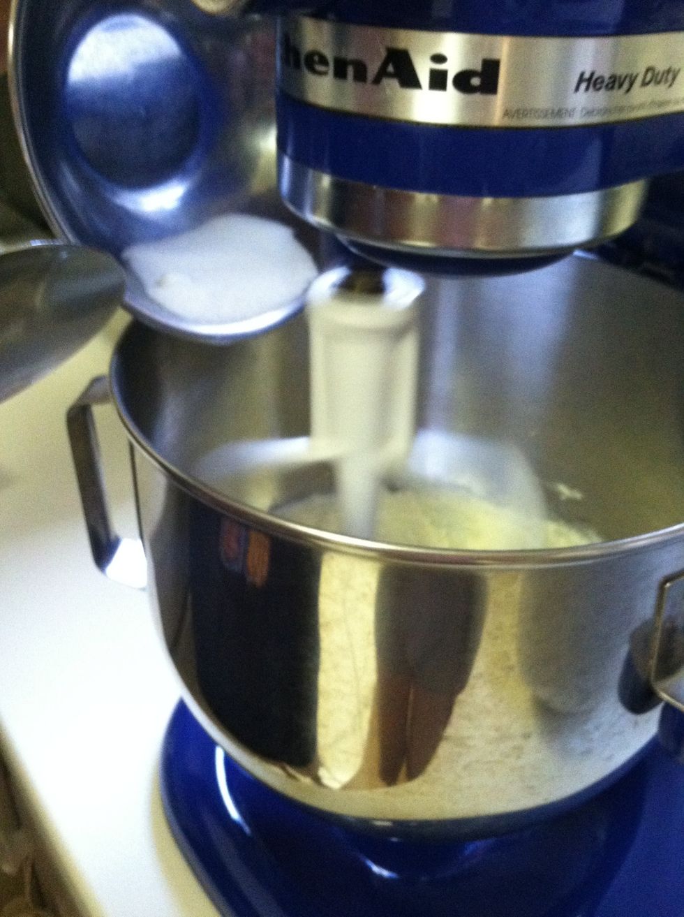 Keep adding sugar, a little at a time and the batter will get even lighter in color.