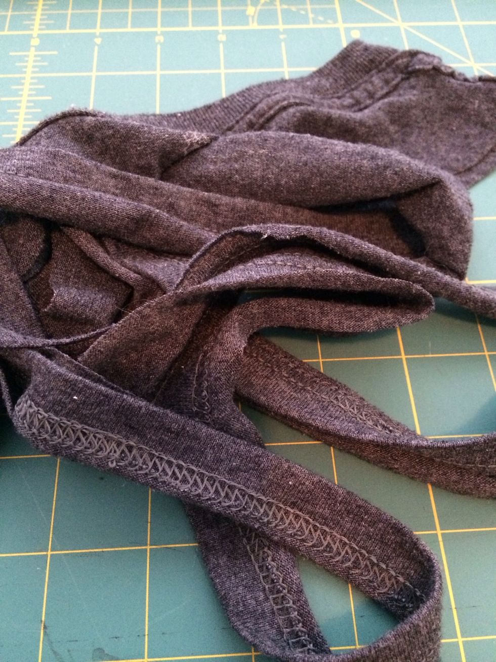 Keep all the scraps! Use them to cut 9 little boom-a-rang shaped pieces for the chest.