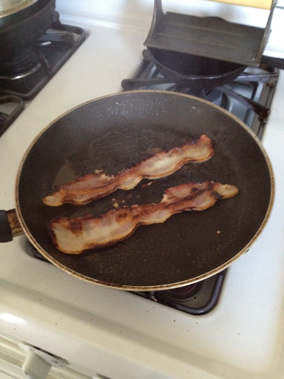 Keep an eye on your bacon. Turn it over and cook until crispy.