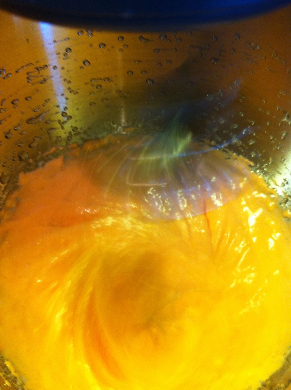 Keep beating until the bottom of the bowl is lukewarm to the touch, about 120 F.