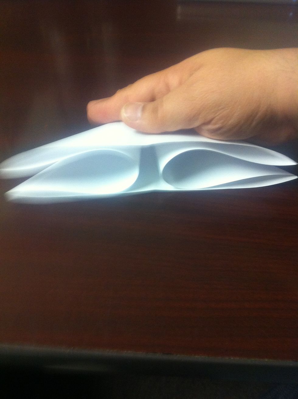 Keep "bottom" side towards your body and gently push the two sides towards the middle.