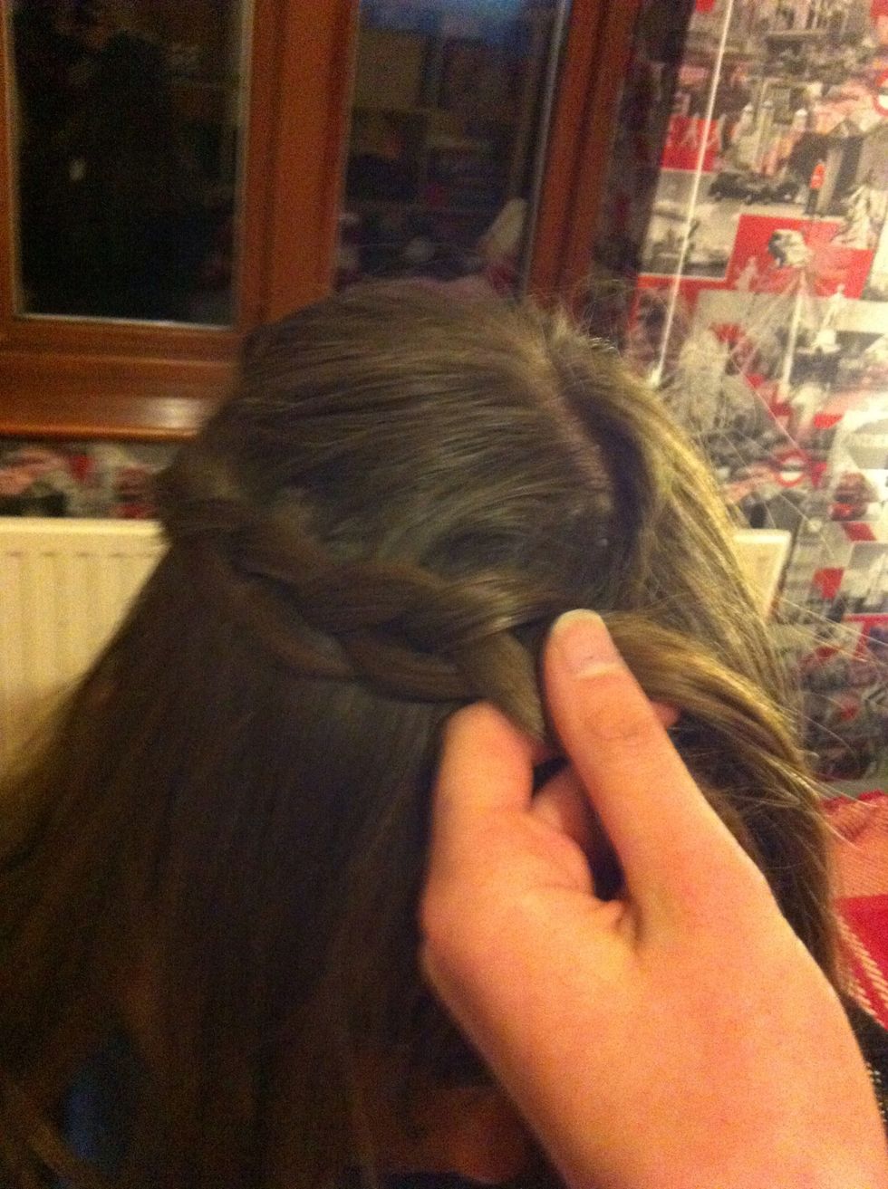 Keep braiding over your forehead...