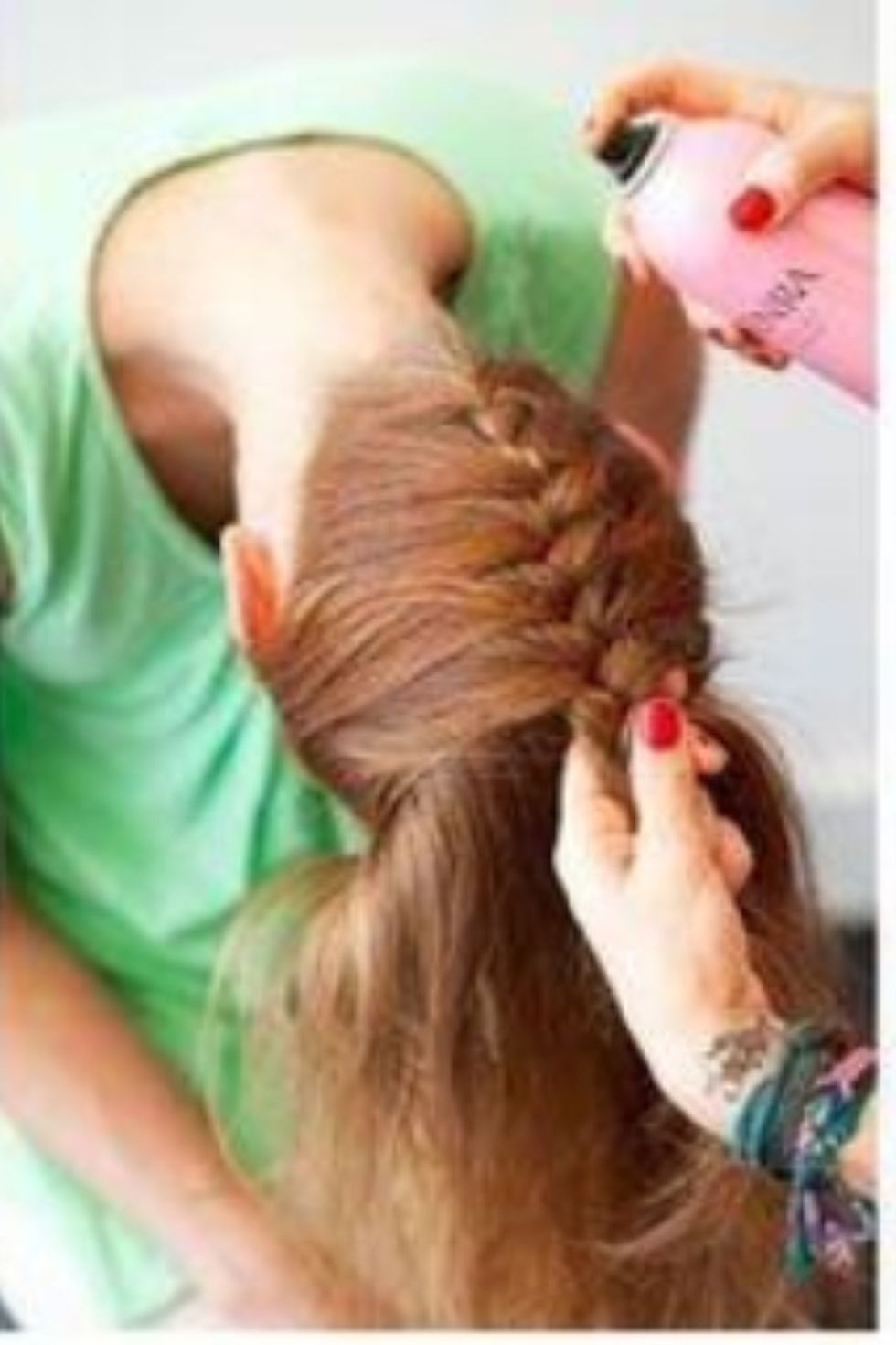 Keep braiding till you get to about the top of the head. Or until you want to. Spray hairspray throughout the hair