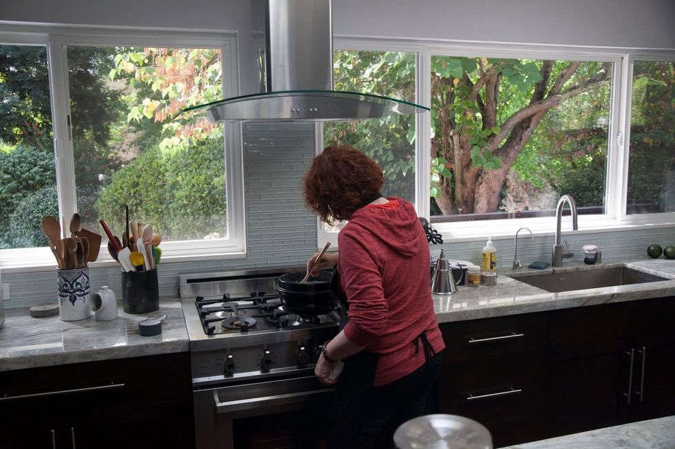 Keep cooking it on a low flame and keep stirring until the milk starts to thicken. Scrape down the sides of the pan as you stir to prevent sticking, or burning. This should take about 25 minutes.