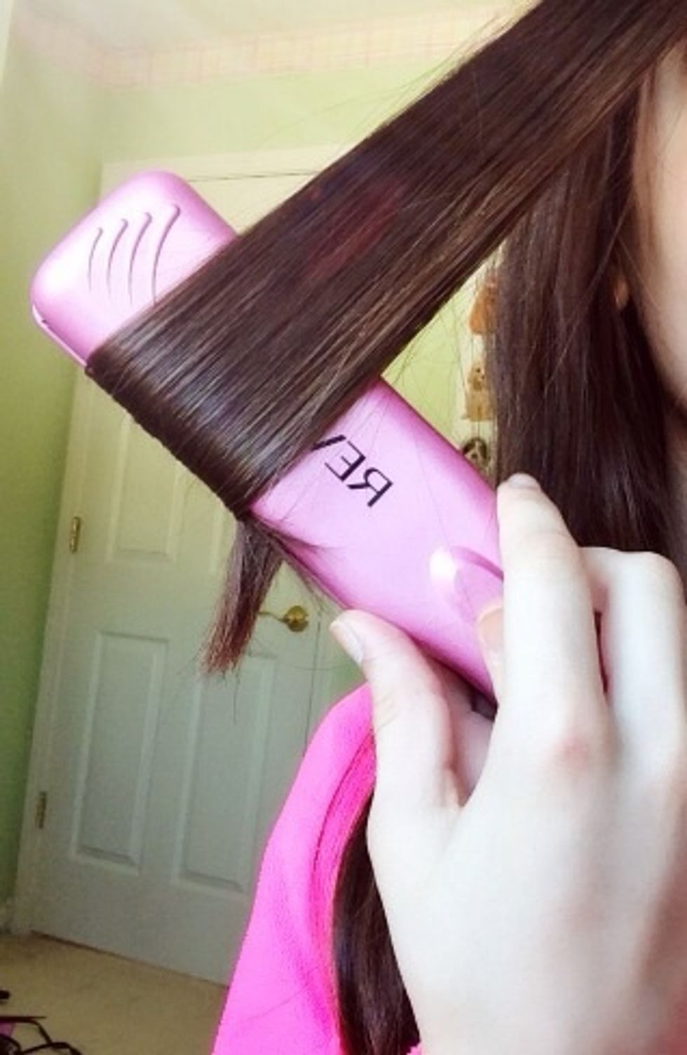 Keep curving it until you see the end of your hair come out the bottom