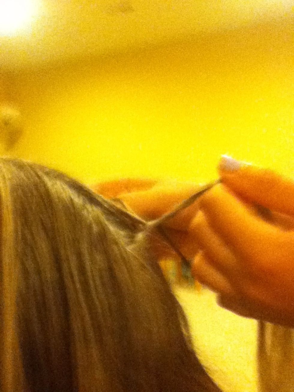 Keep doing that . Braid slightly upwards takig hair only from the top.:) do this about 3 times