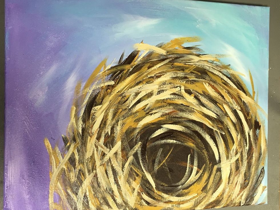 Keep doing this around the circle working from dark to light. Notice the textured strokes follow the contour of the circle which is darkest in the center.