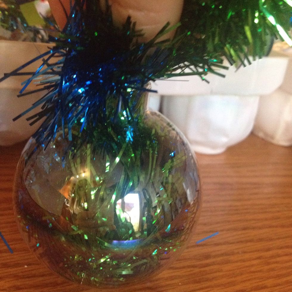 Keep feeding it through until it's too difficult to fit much more in.