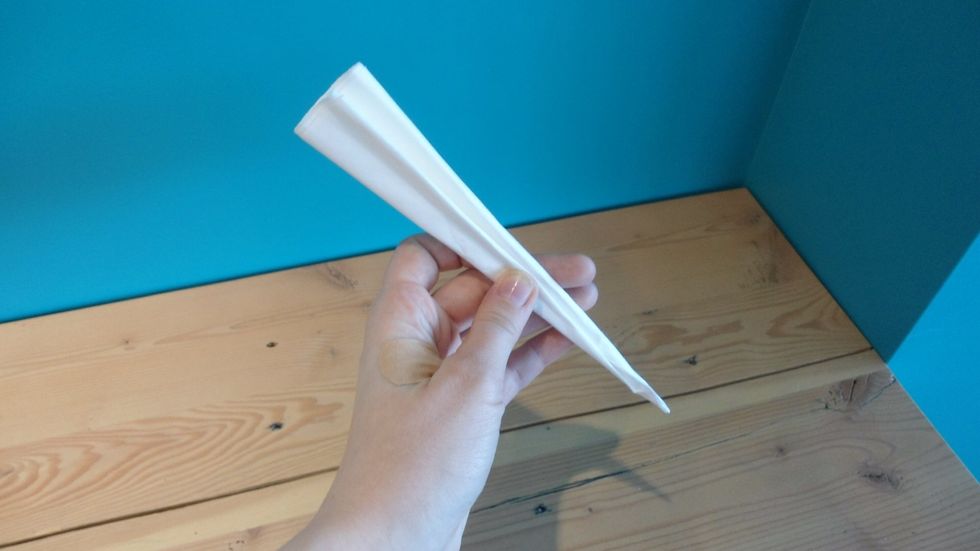 Keep folding it in half until you can't anymore.