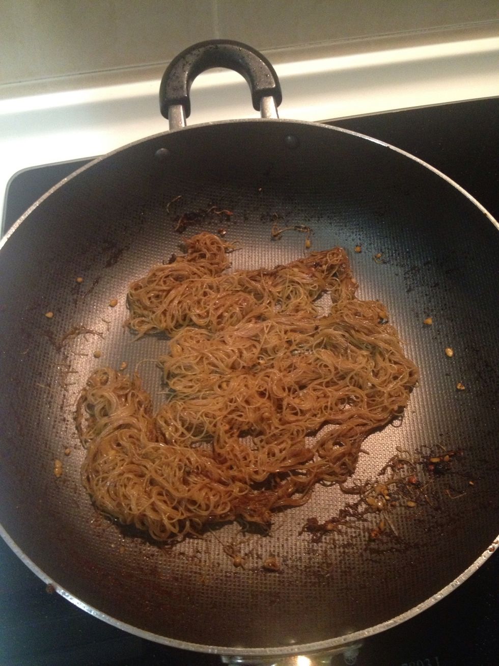 Keep frying in low heat, make sure it absorbs all the water. Note: if you find the color too dark, just add some plain water.