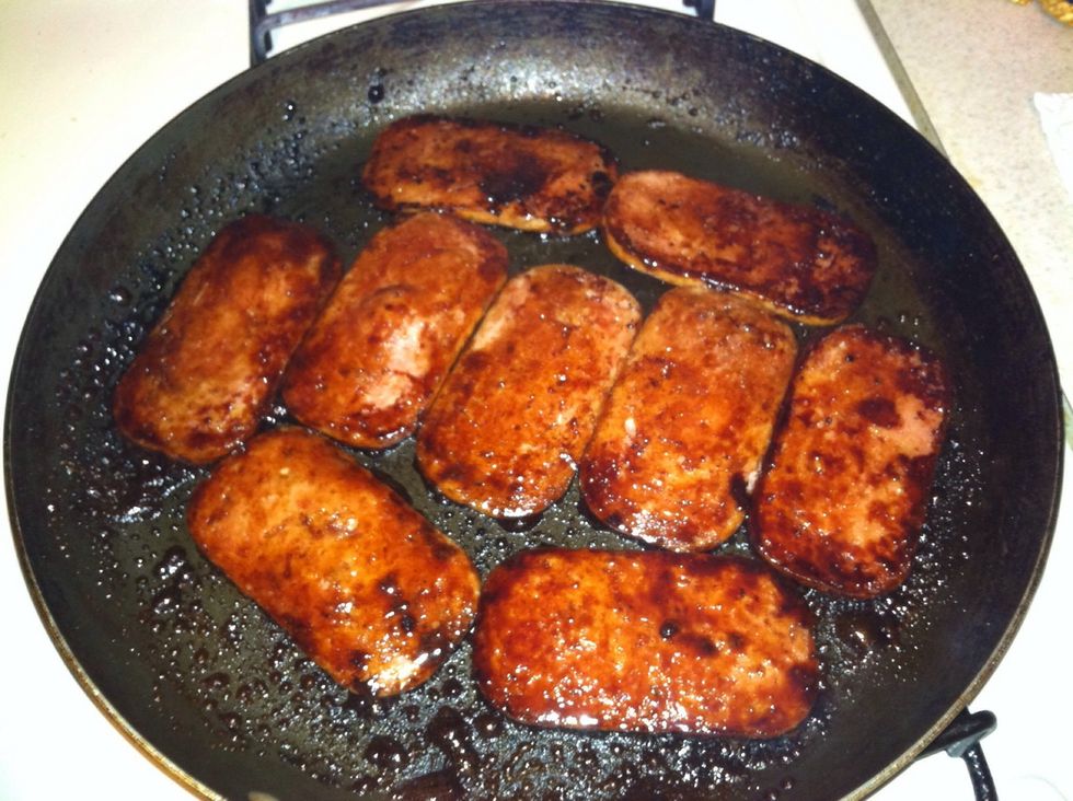 Keep frying until you reach your desired level of crispness. Once done, transfer the Spam to a plate.