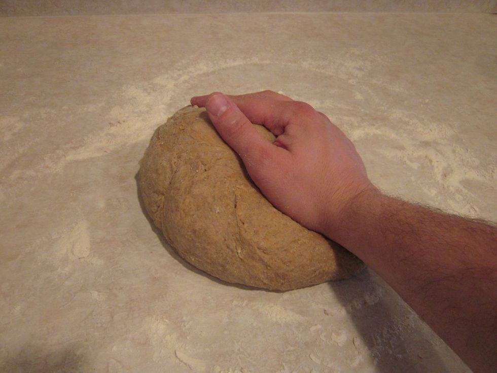 Keep going, add flour if it's sticking. You're not going to over knead it.