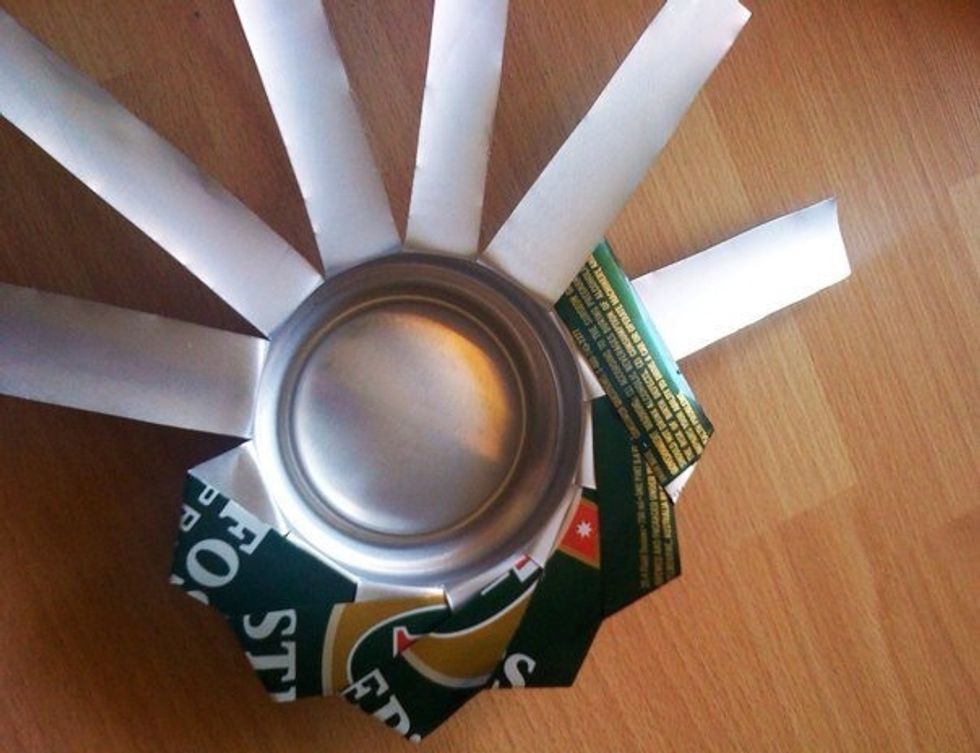 Keep going all the way around...careful not to slice yourself or rip the strips.