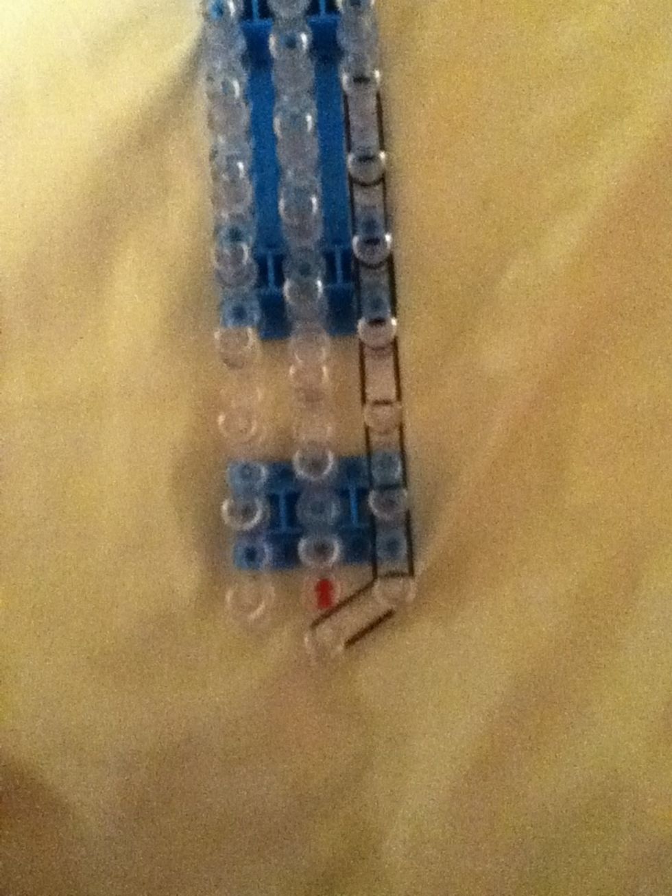 Keep going up the right side untill you reach the second to last peg