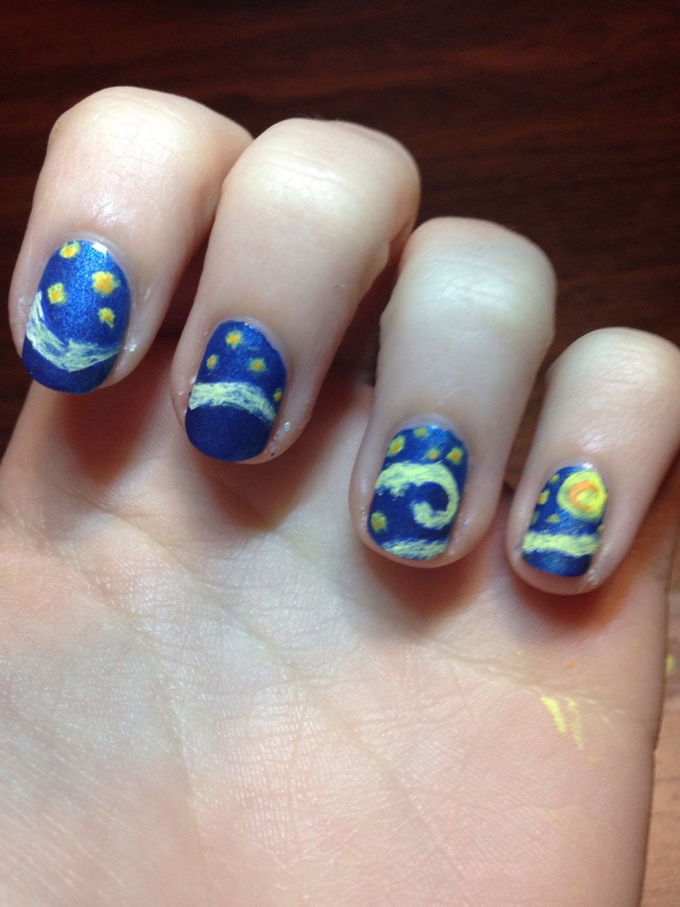 Keep in mind we aren't going for particularly neat work, so cover the original blue waved lines with the yellow and orange color