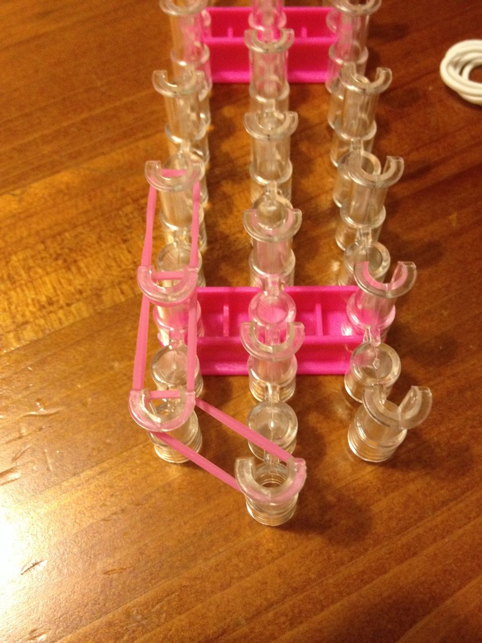 Keep looping bands up the loom in a straight line till the end. NOTE: ensure bands are not twisted