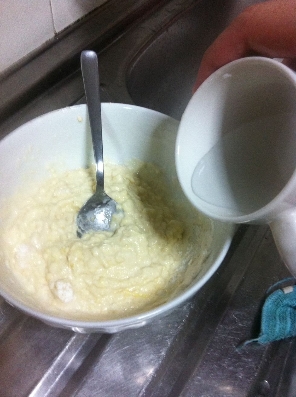 Keep mixing, slowly add in water keep mixing