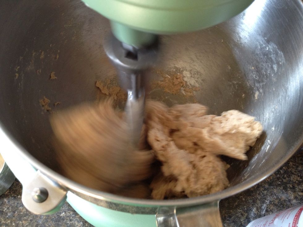 Keep mixing until all of the dough pulls away from the bowl and you have a solid mass.