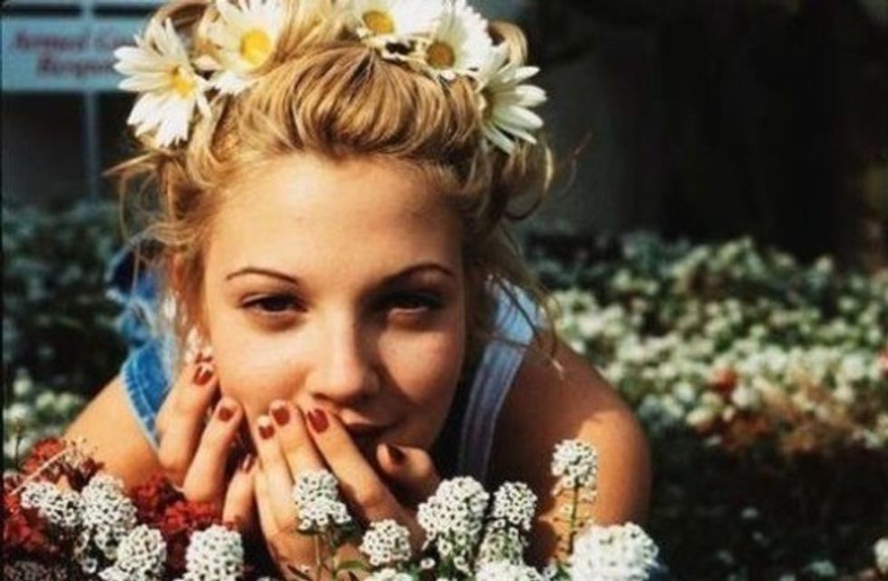 Keep on braking and sliding the daisies till you've got something like this then with the last daisy slide the first daisy that you did's head and your done:) you shall look lovely.